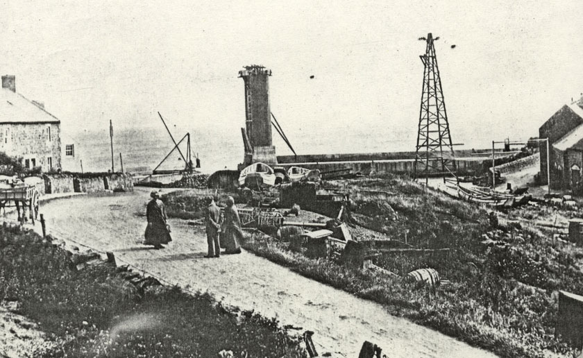 Storage bins on the south pier and the pylon on the foreshore.